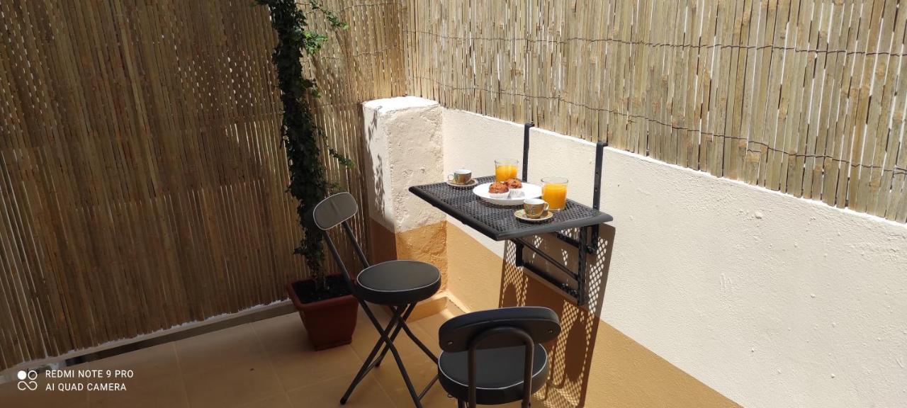Апартаменты Mi Pequena Terraza Алакуас Экстерьер фото
